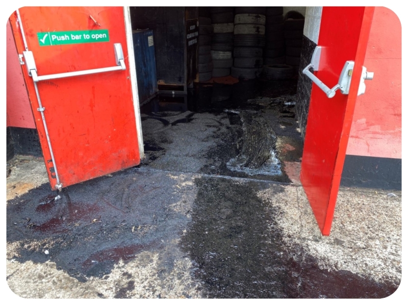 Before Oil Spill cleanup at car garage