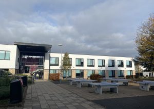 Modern commercial school with brigh clean rendered exterior that has been refreshed with a professional render clean and paint by Brooklands service group.