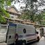 Scaffolding and cleaning vans at a historic building undergoing renovation and heritage cleaning.