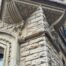 Intricate stonework and detailed architectural features on a historic building after a preofessional stone clean by Brooklands Service Group.